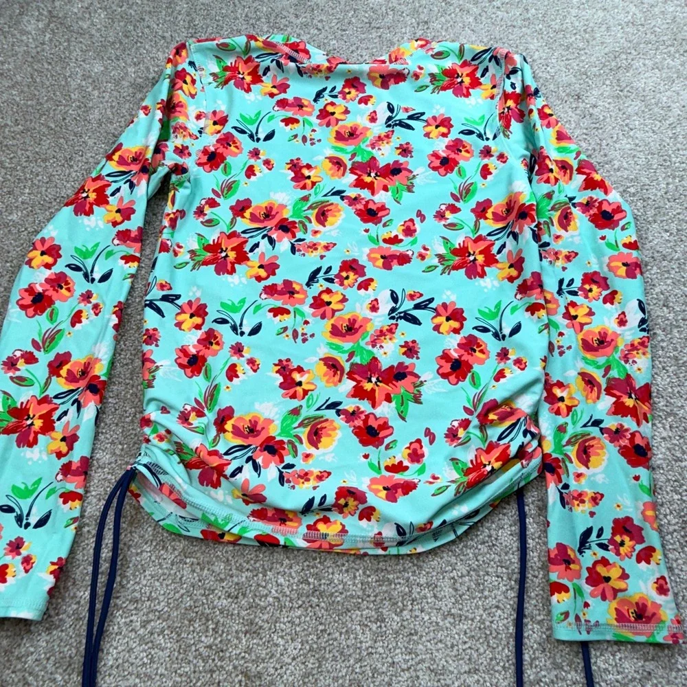 RuffleButts Kids Girls Aqua Floral Long Sleeve Rash Guard Swim Top Side Ties 14